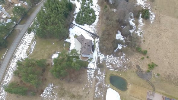 Vertical Flight Over House With Rotation