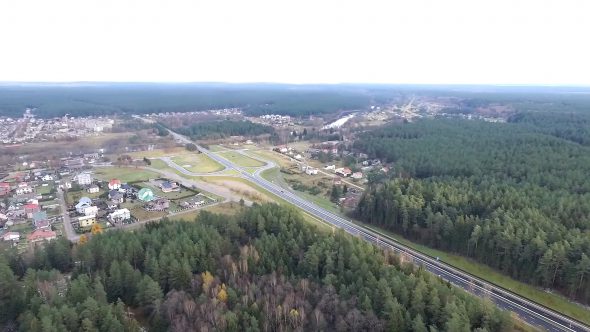 Flight Over The Forest And Small Town In Distance 3