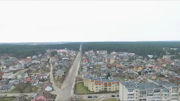 Flight Over Small Town Near Forest 6