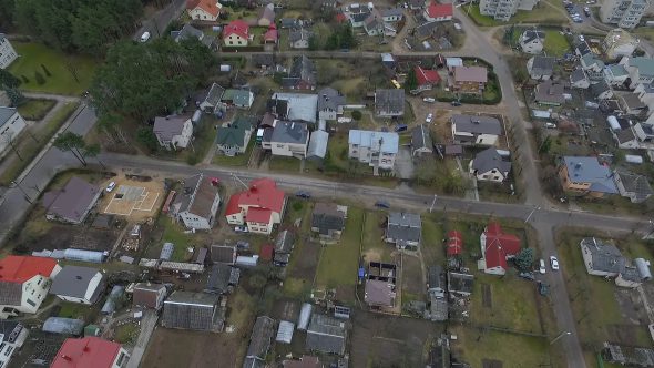 Flight Over Small Town Near Forest 10