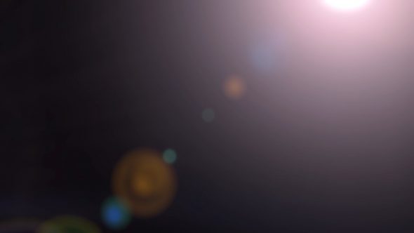 Blurred Dust Particles With The Light Source And Lens Flares